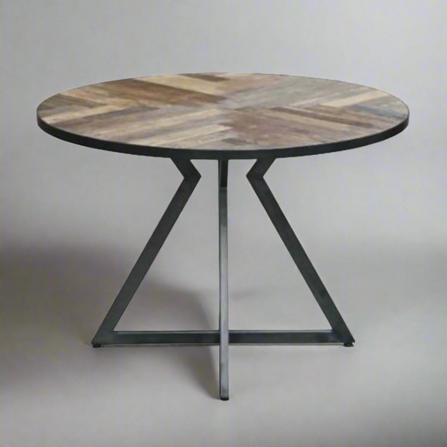Bordeaux 4 Seater Round Space Saving Dining Table Reclaimed Wood in studio