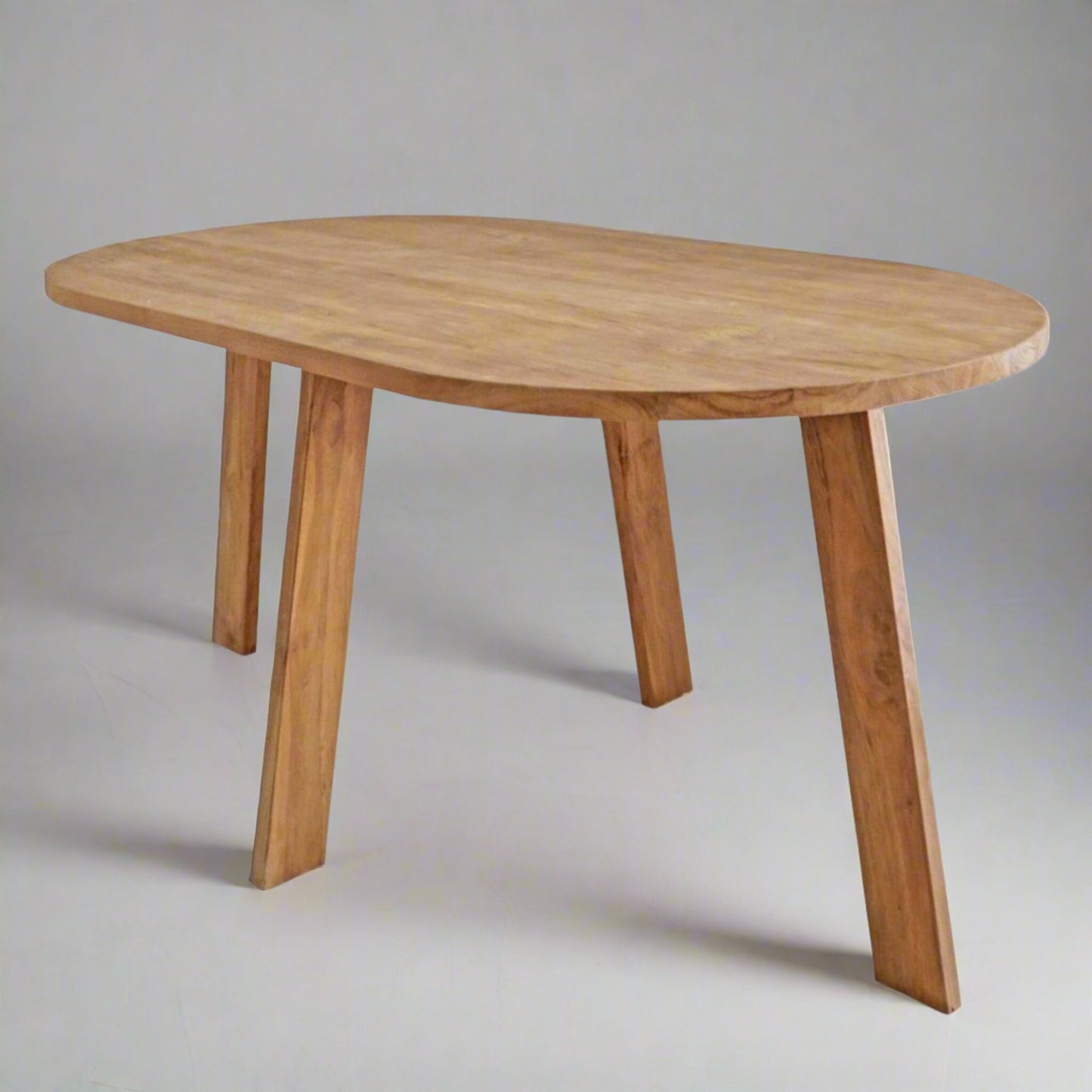 Esbjerg 4 Seater Oval Dining Table Teak in studio