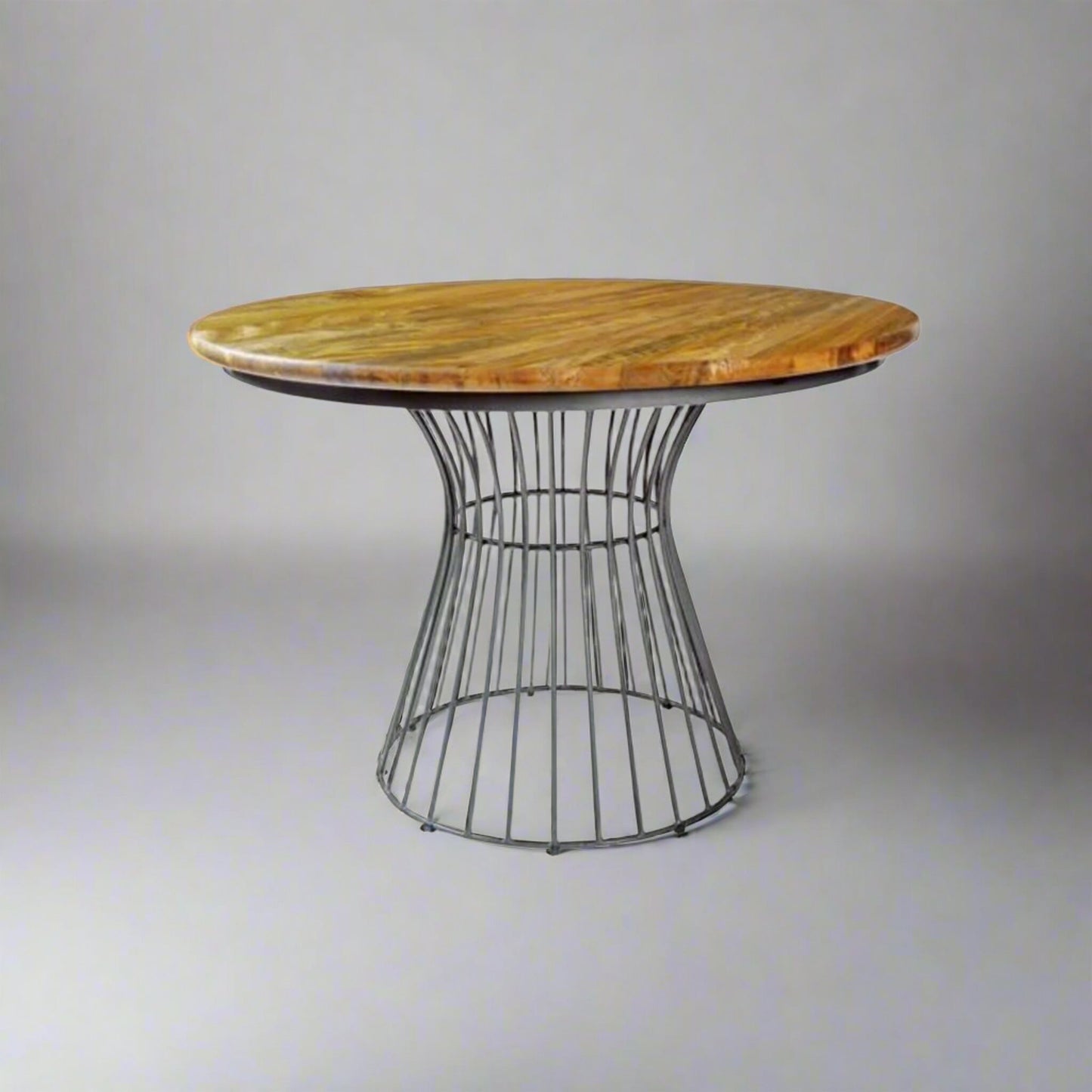 Hudson 4 Seater Round Birdcage Dining Table Mango Wood Steel in studio