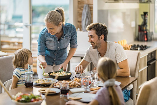 A family eating around a dining table