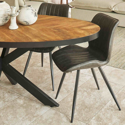 Cognac 6 Seater Oval Dining Table Teak Parquet with Modena Dining Chair Forest Green close up