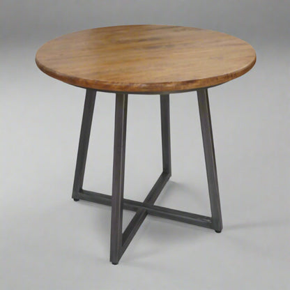 Hudson 4 Seater Round Space Saving Dining Table Mango Wood Steel in studio