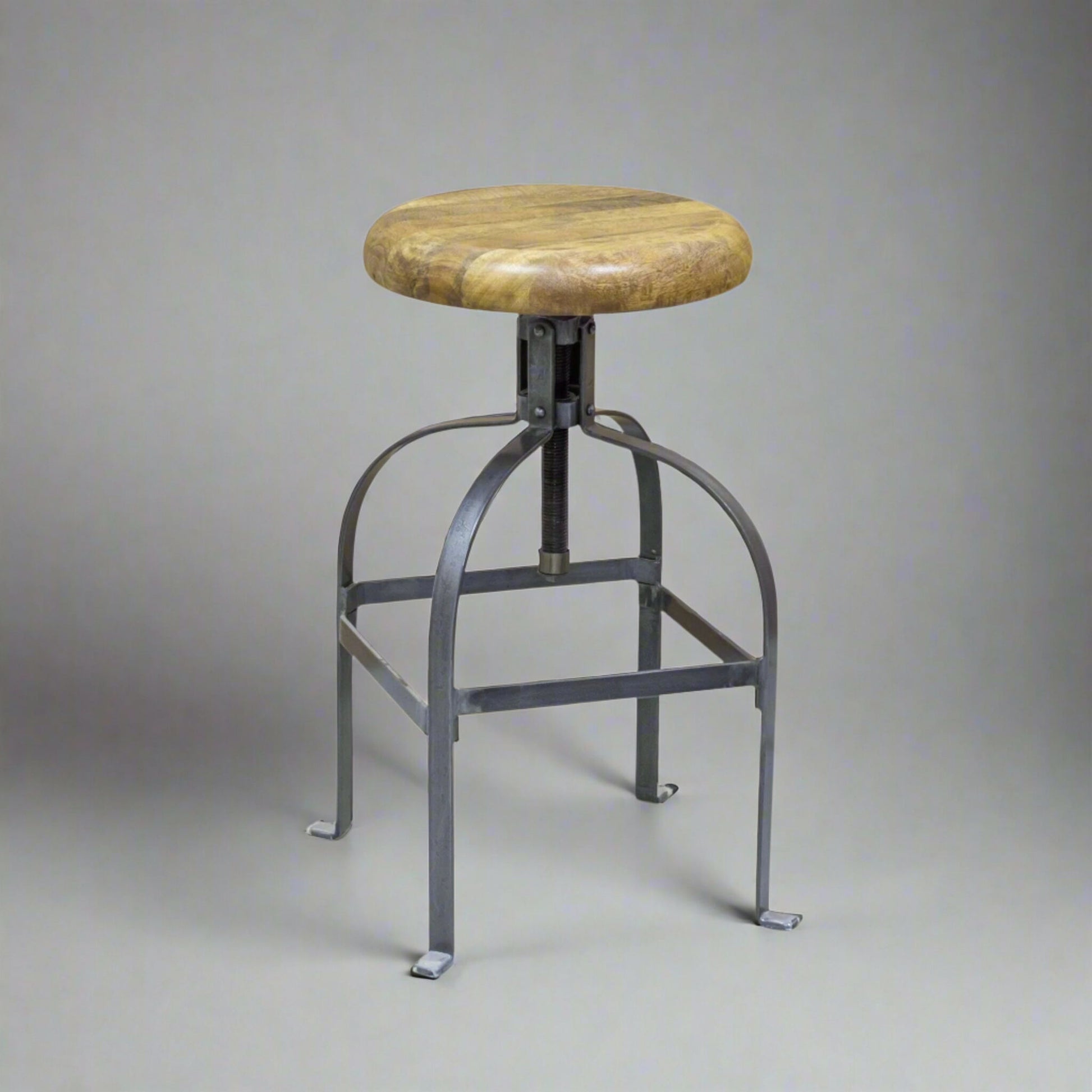 Hudson Height Adjustable Swivel Stool Mango Wood Steel in studio
