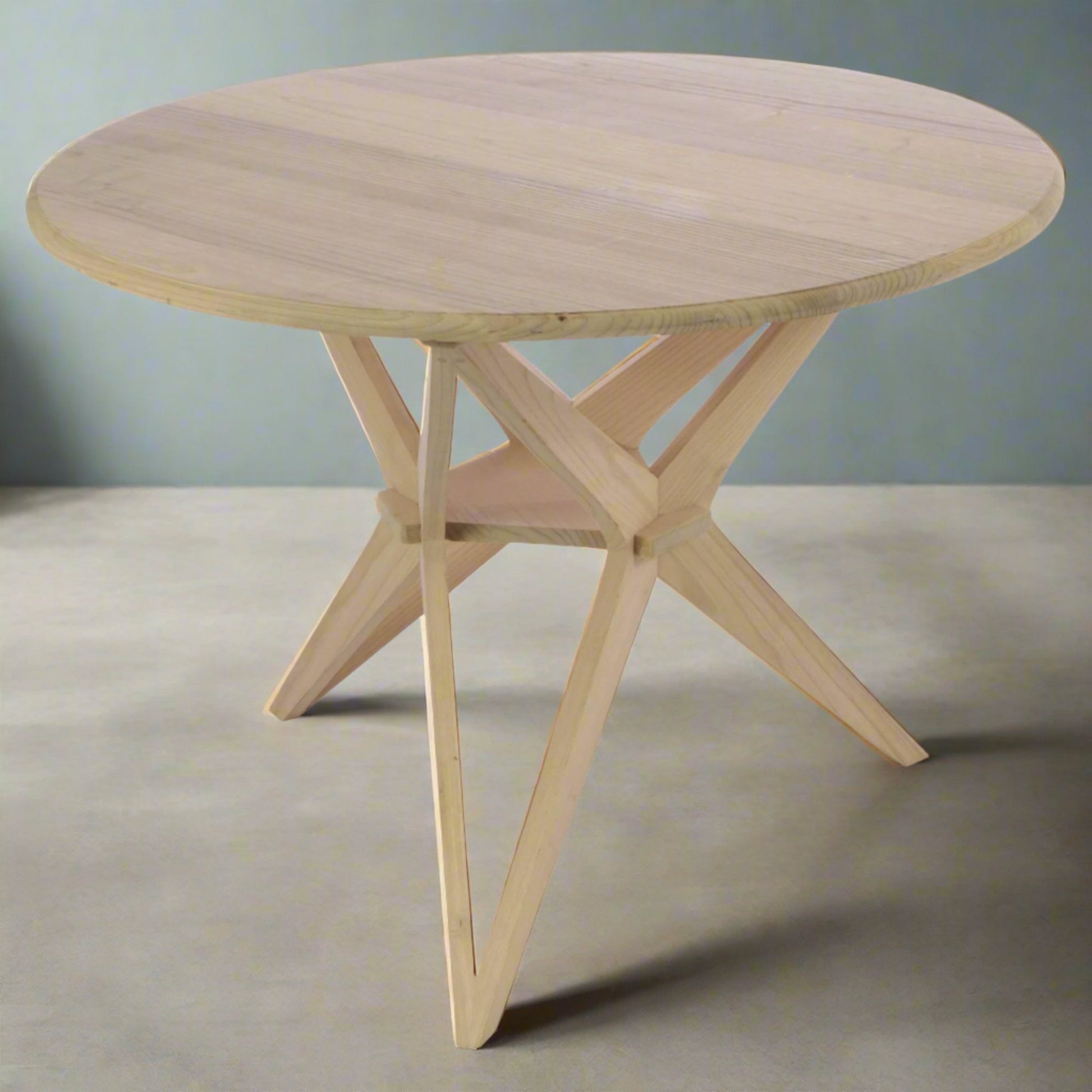 Malmo 4 Seater Round Dining Table Sungkai Wood Scandinavian style in studio