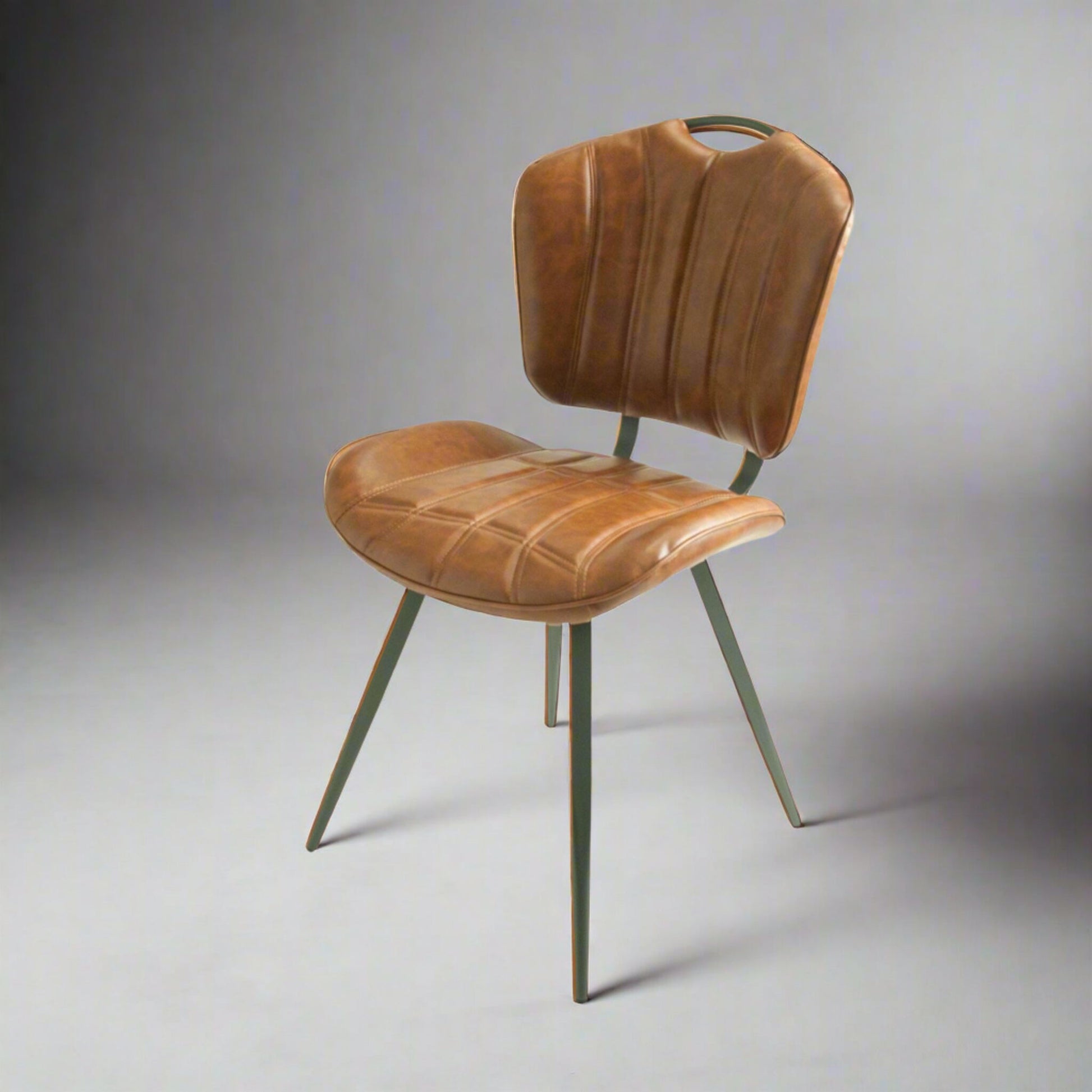 Turin Dining Chair Vegan Leather Steel Tan in studio